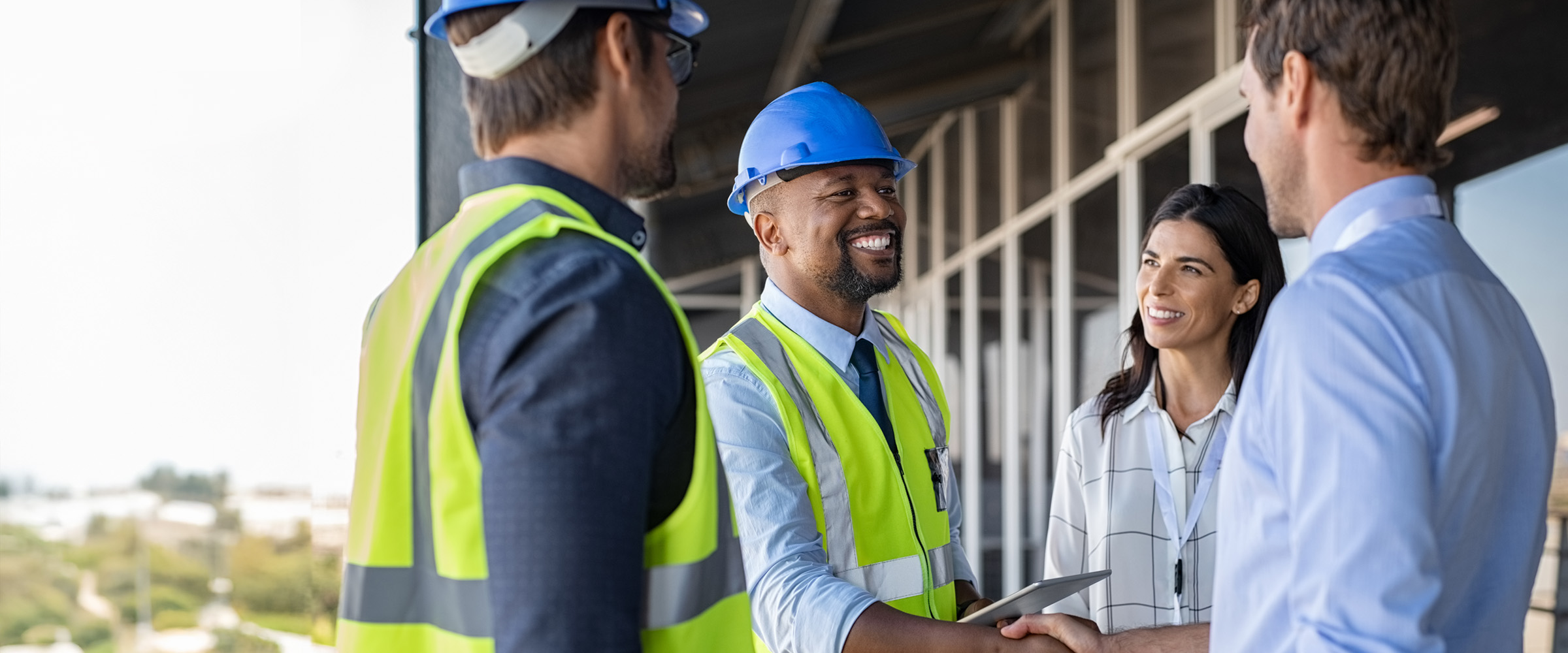 VPO-banner-team-handshake-smiles-tablet-1